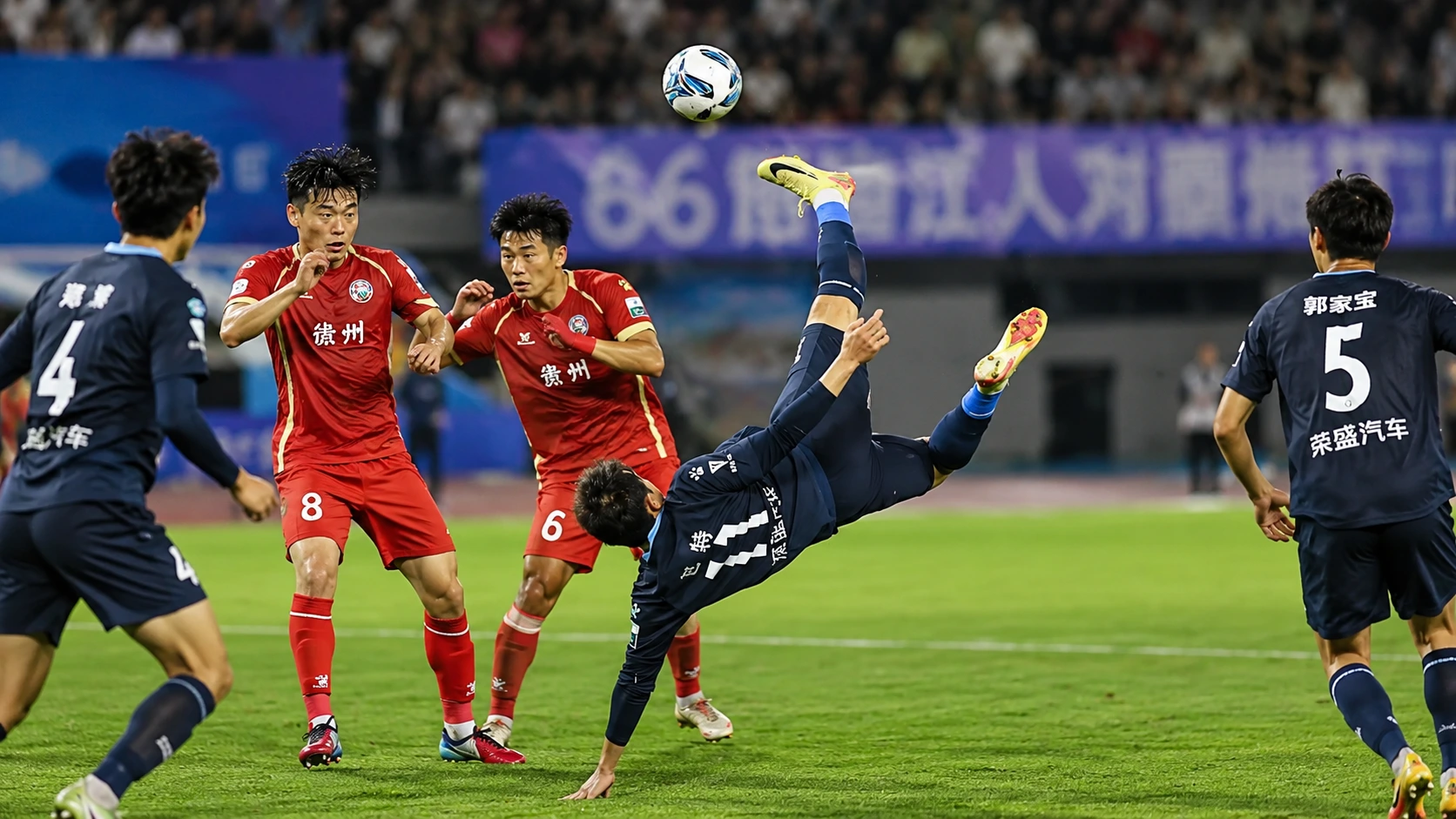 Player in navy kit does an acrobatic bicycle kick as defenders look on