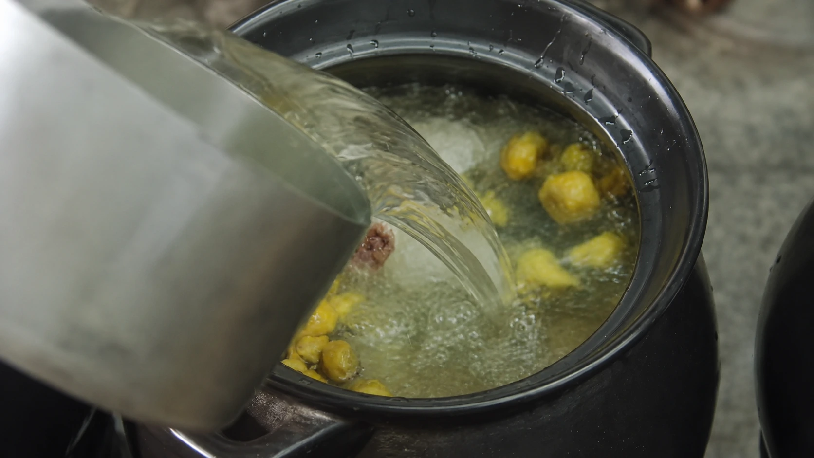 Clean ingredients prepared with water for slow-cooked Cantonese soup