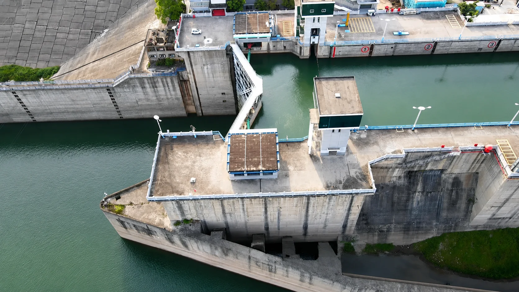 A steel lock gate holding back extreme water height