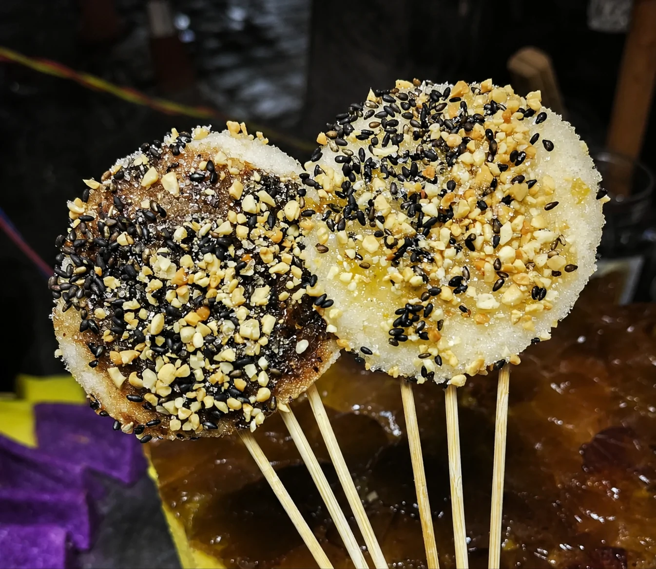 Jinggao topped with sesame seeds and crushed peanuts