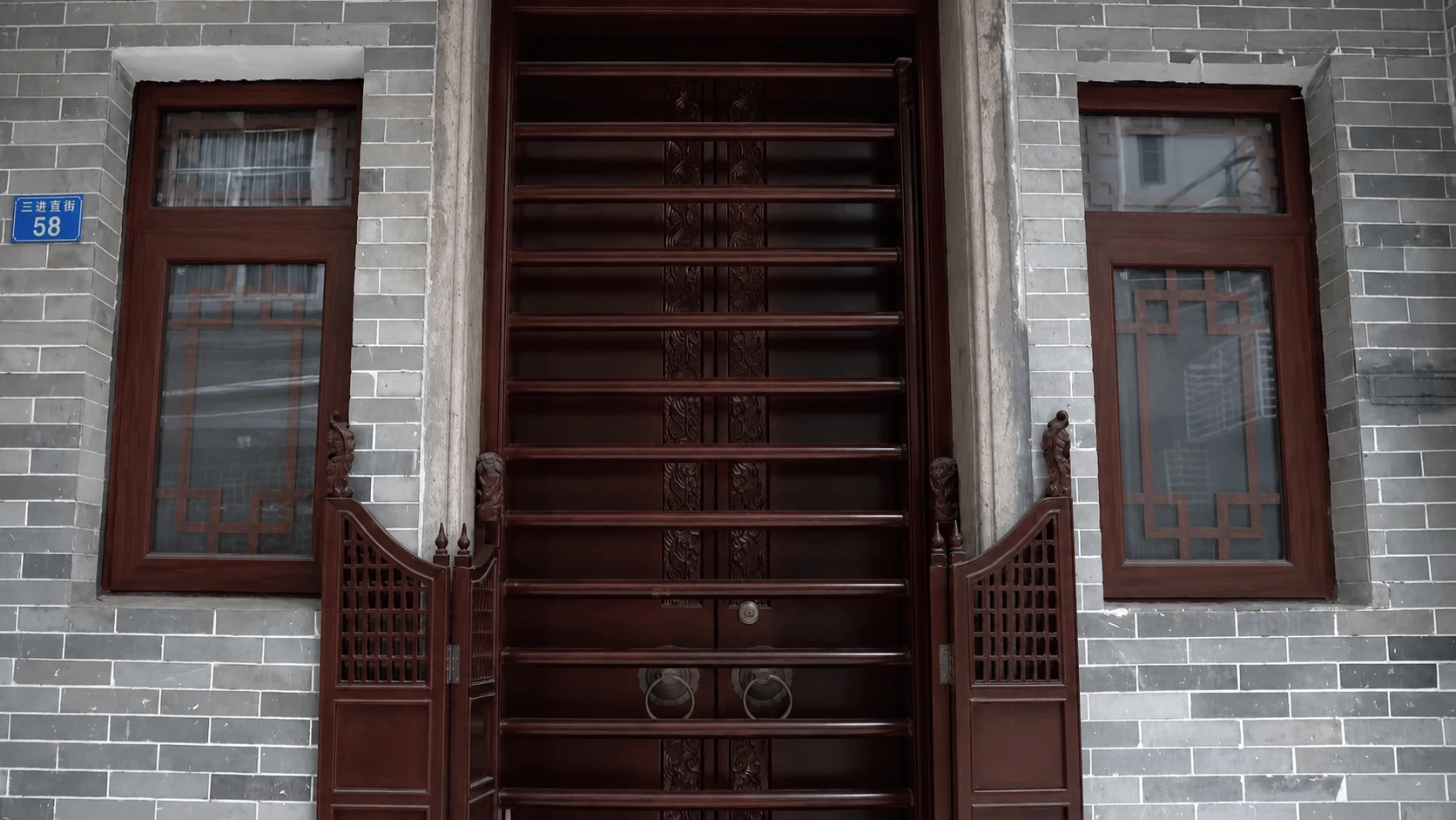 Restored wooden front door with stone threshold