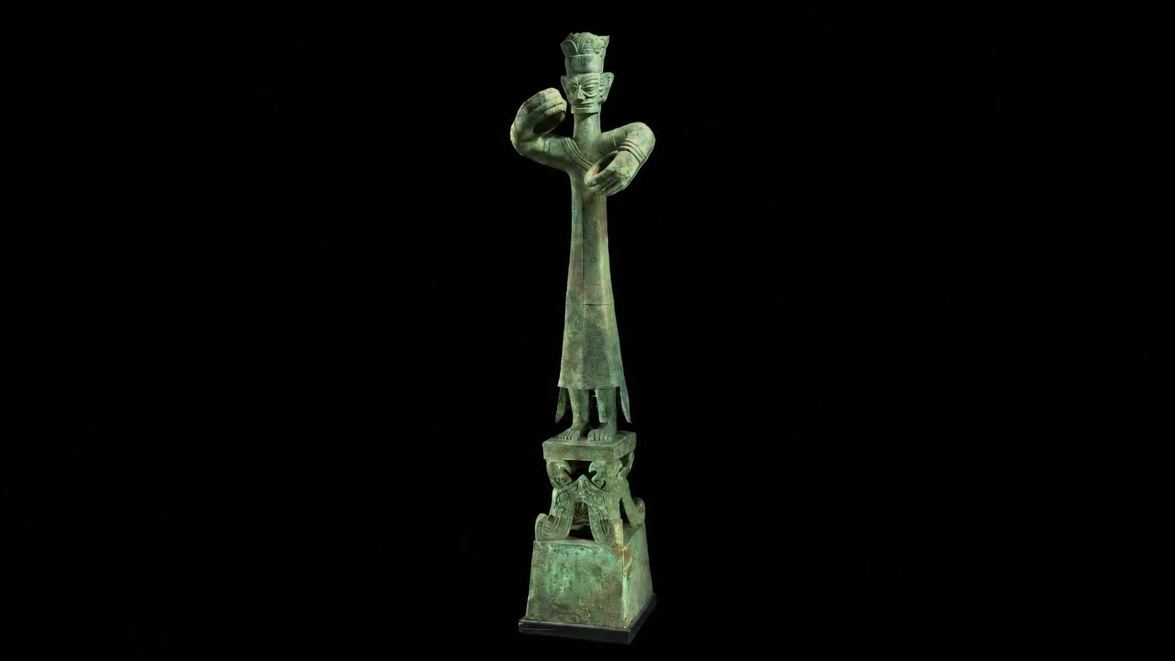 A tall, slender bronze standing figure with oversized hands and elaborate robes from Sanxingdui
