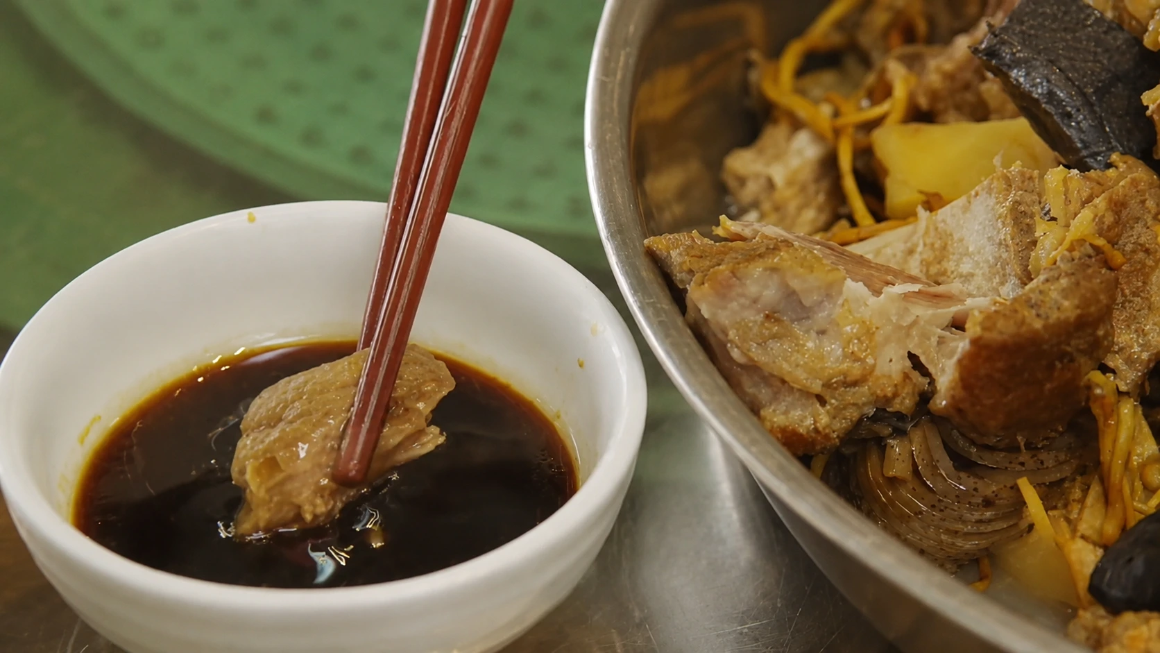 Soup solids with soy sauce as a Cantonese side dish
