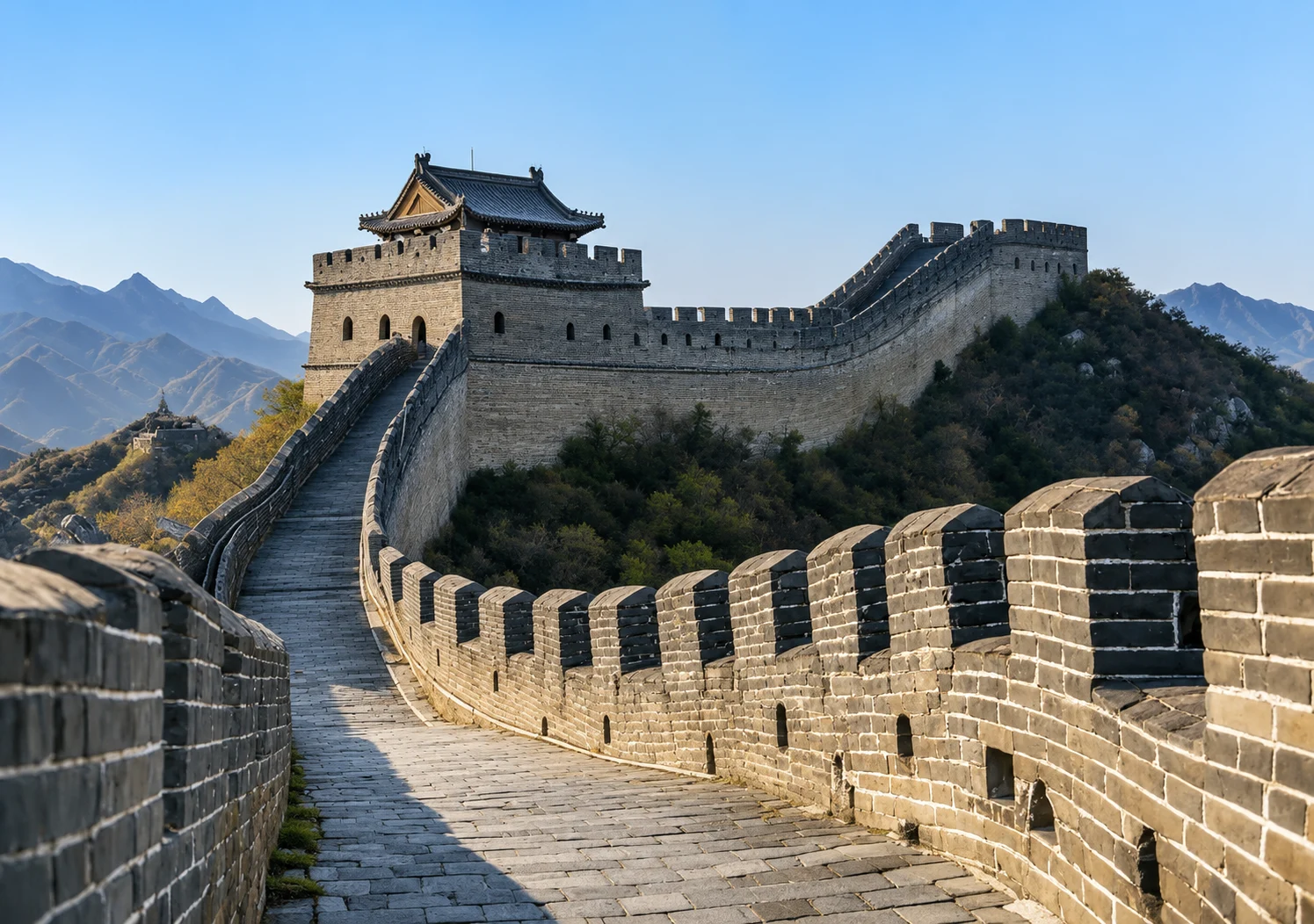 Winding city wall built along rugged mountains