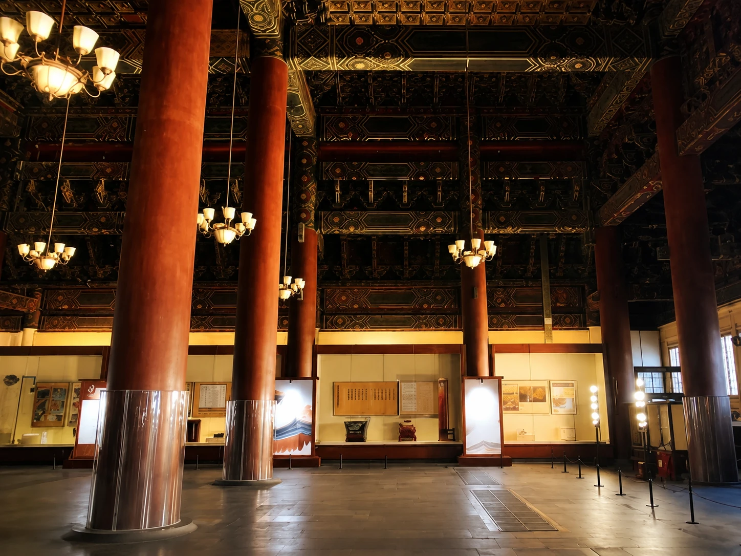 Exposed wooden beams and pillars forming the internal frame of a palace hall